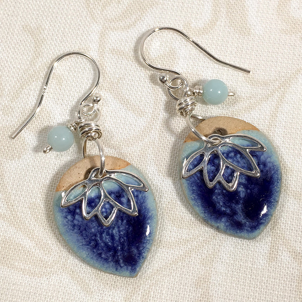 Sterling earrings with two-tone blue art ceramic charms, lotus charms, and amazonite beads