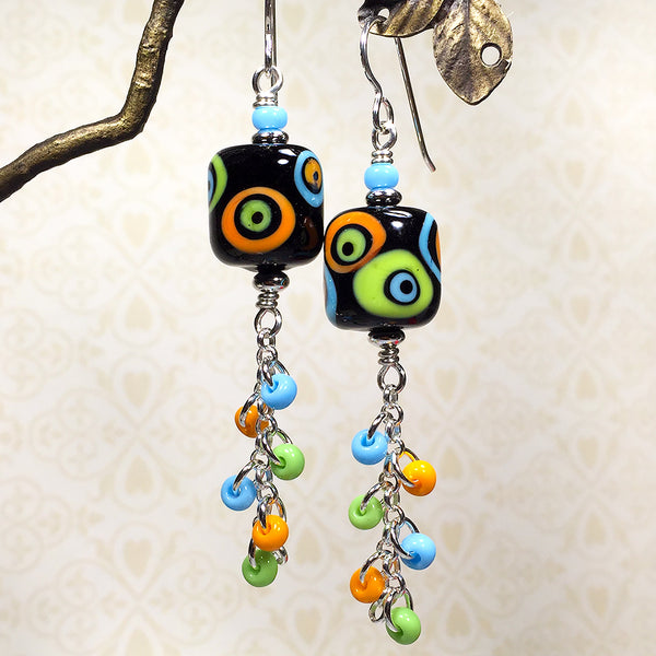 Sterling earrings with black/orange/blue/green mod style art glass beads
