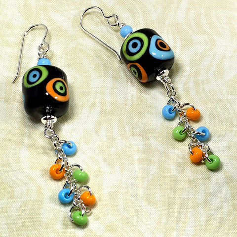 Sterling earrings with black/orange/blue/green mod style art glass beads