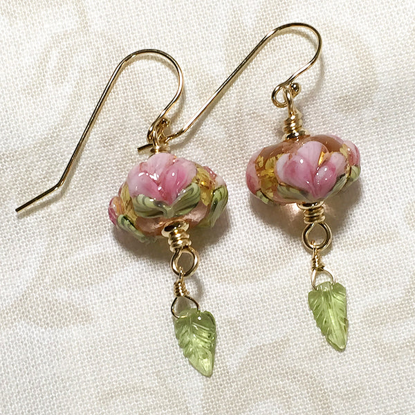 Gold-filled earrings with pink peony art glass beads and carved peridot leaves