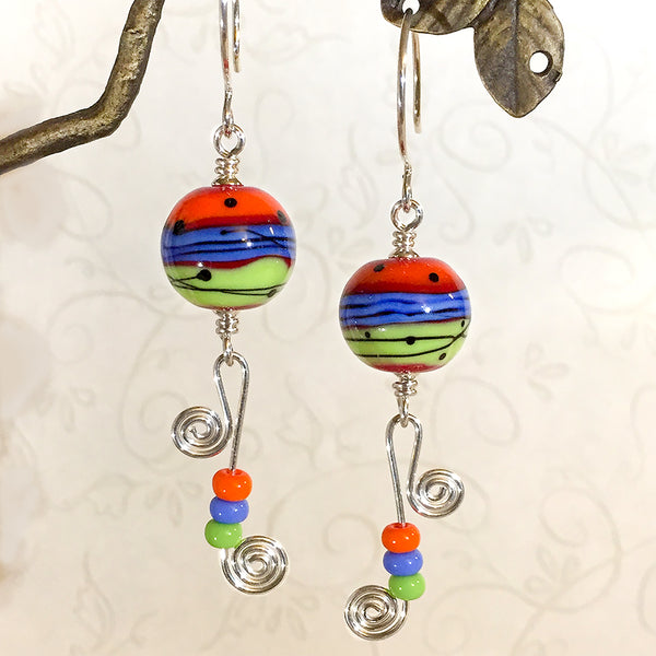Sterling earrings with orange/blue/green mod style art glass beads and wire & bead spirals