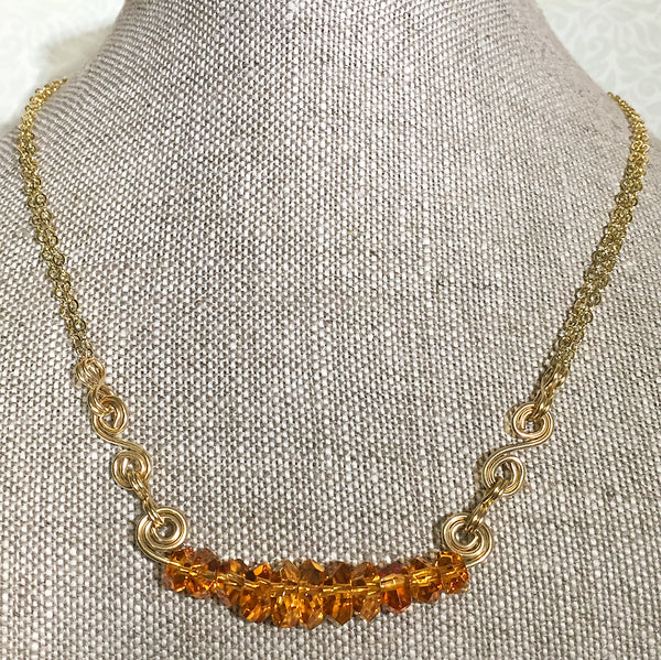 Gold-filled spiral necklace with faceted citrine nugget beads