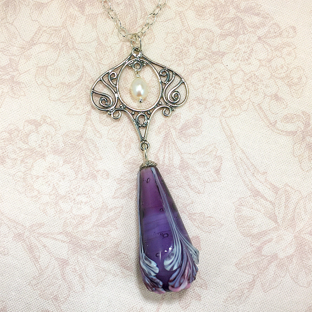 Sterling Art Nouveau style necklace with purple floral art glass bead and white freshwater pearl